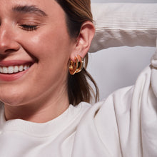 Hidden Heart Hoop Earrings and Toni Hinged Hoop Earrings in Gold on Model