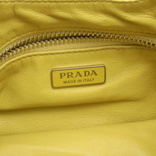 Prada | Pre-Owned Nappa Soft Padded Re Edition 2002 Moon Satchel | Yellow