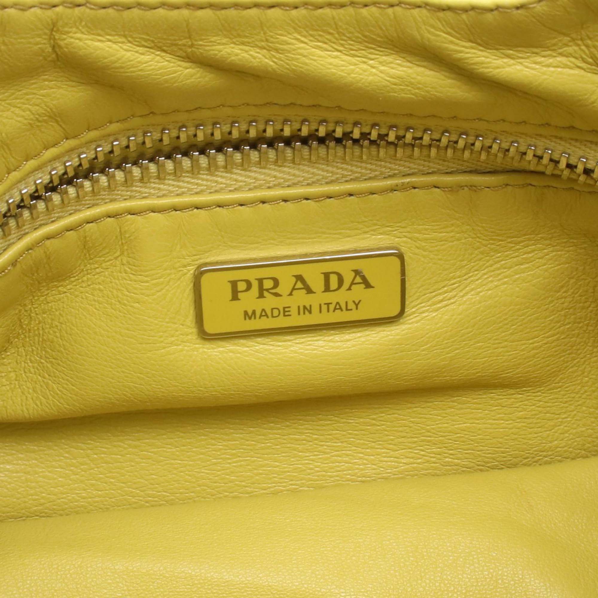 Prada | Pre-Owned Nappa Soft Padded Re Edition 2002 Moon Satchel | Yellow
