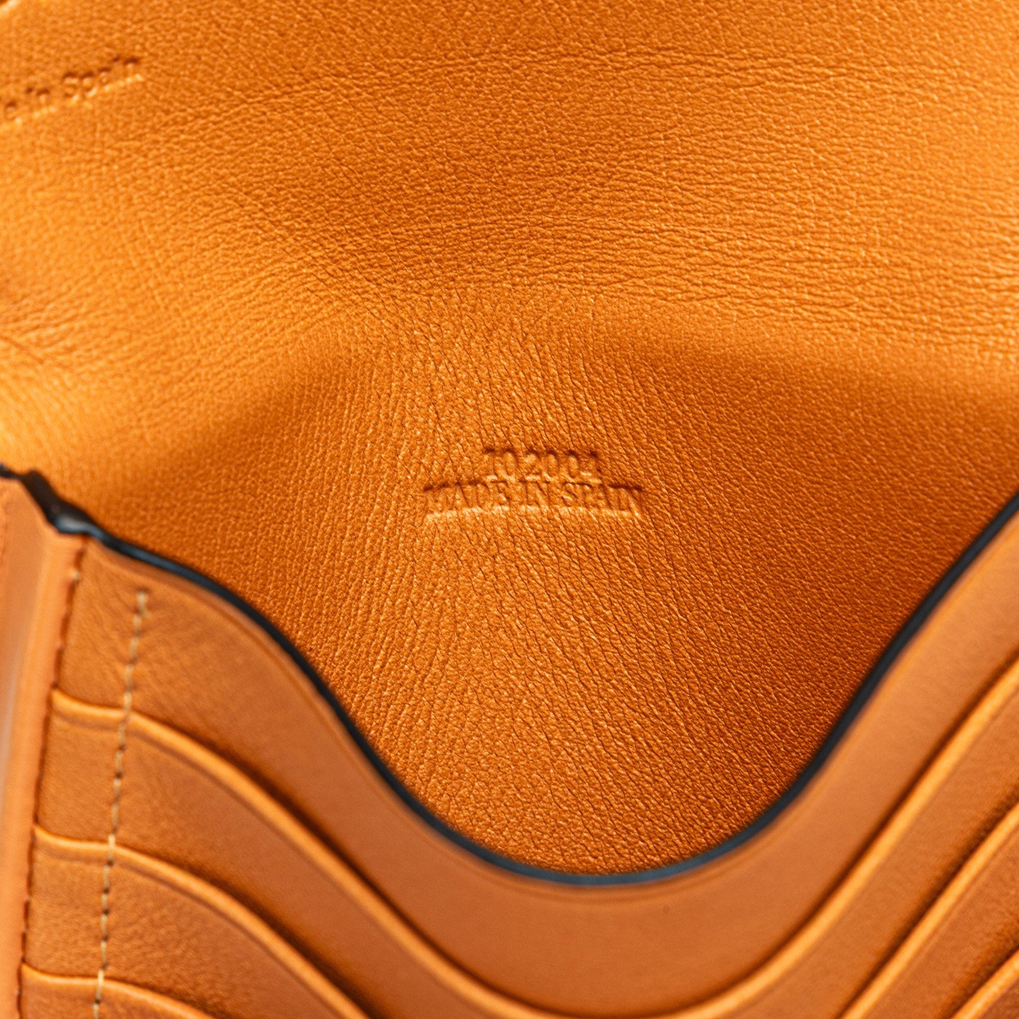 LOEWE | Pre-Owned Small Soft Calfskin Heel Pouch | Orange/Light Orange