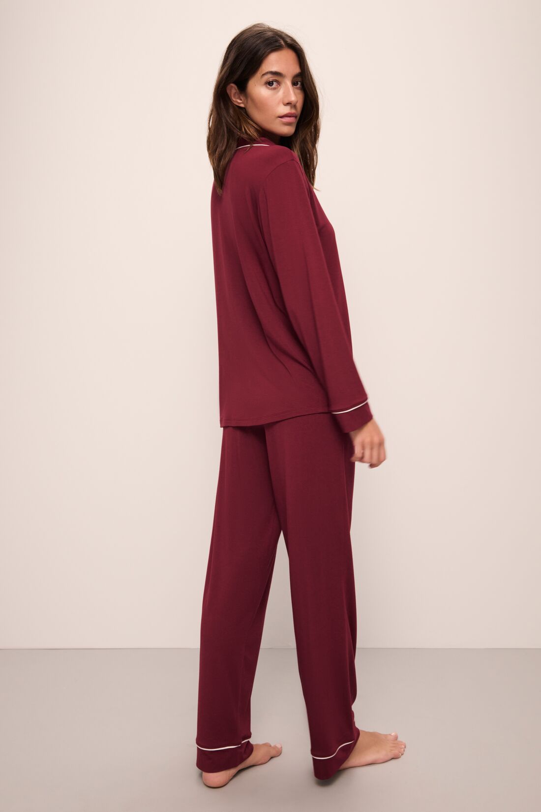 Model wears Gisele TENCEL Modal Long PJ Set in Cabernet/Ivory/