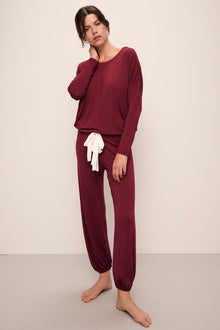 Model wears Gisele TENCELâ„¢ Modal Slouchy PJ Set in Cabernet/Ivory.