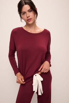 Model wears Gisele TENCELâ„¢ Modal Slouchy PJ Set in Cabernet/Ivory.