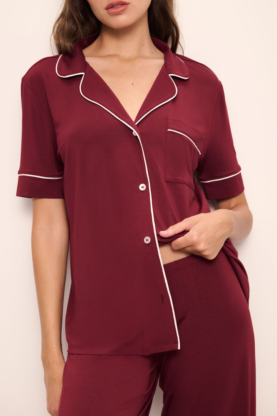 Model wears Gisele TENCEL Modal Short Sleeve & Pant PJ Set in Cabernet/Ivory.