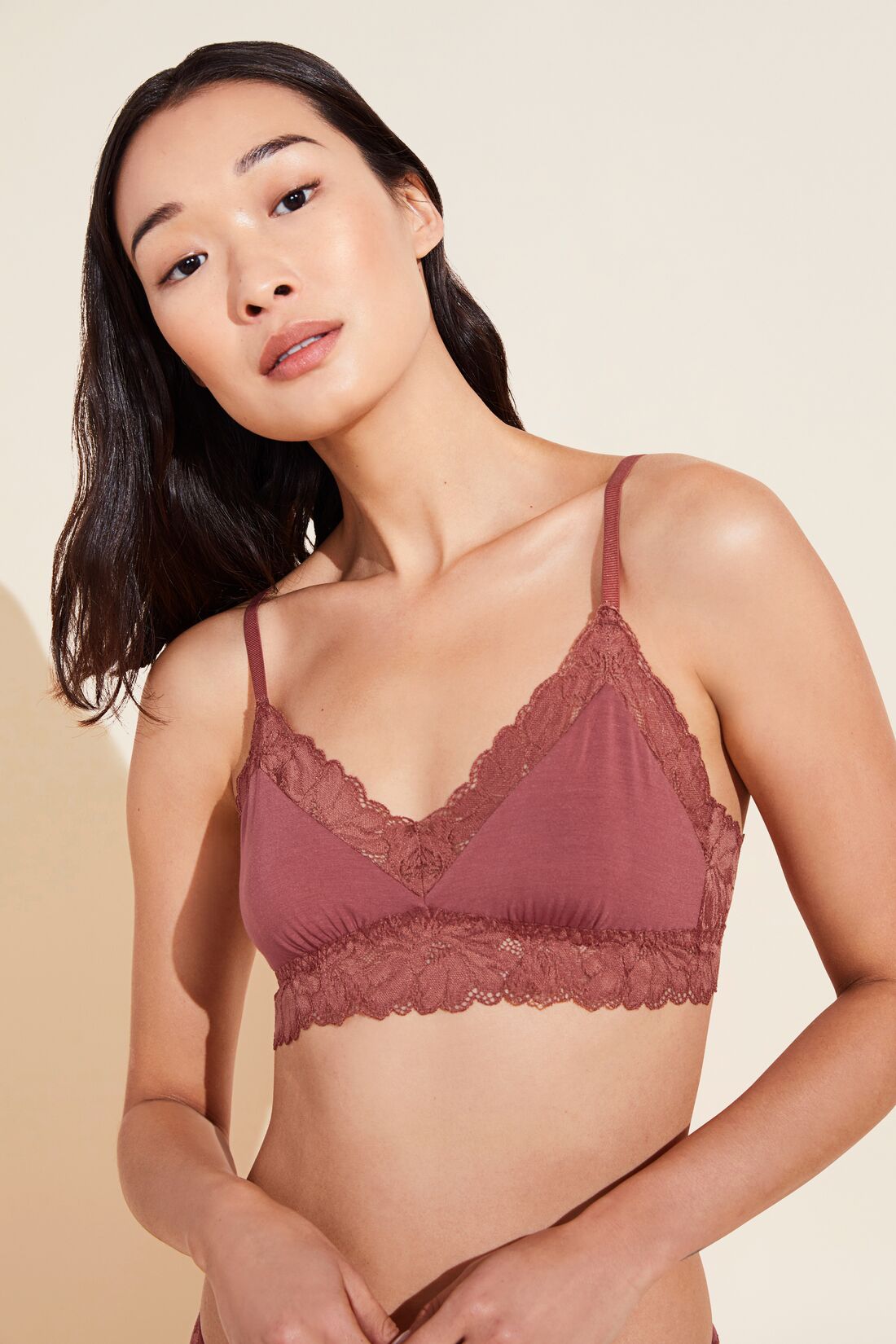 Model wears Rosalia TENCEL™ Modal Bralette in rosewood.