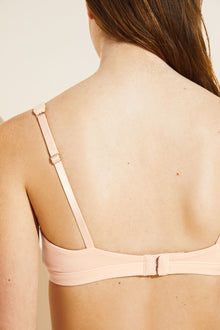 Model wears Pima Stretch Cotton V Bralette in Buff.