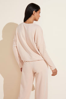 Model wears Softest Sweats Plush TENCEL™ Top in spanish vanilla.