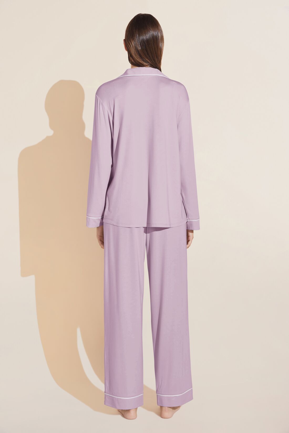 Model wears Gisele TENCELâ„¢ Modal Long PJ Set in lavender/ivory.