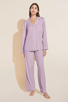 Model wears Gisele TENCELâ„¢ Modal Long PJ Set in lavender/ivory.