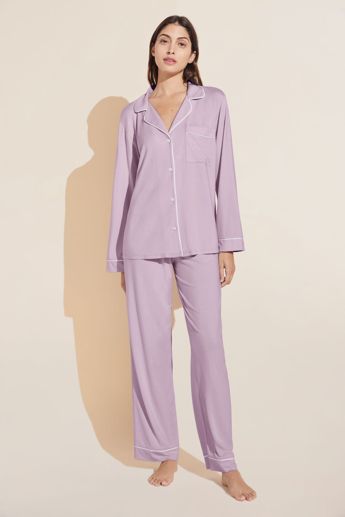 Model wears Gisele TENCELâ„¢ Modal Long PJ Set in lavender/ivory.