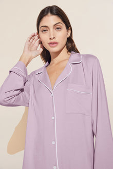 Model wears Gisele TENCELâ„¢ Modal Long PJ Set in lavender/ivory.