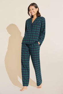 Model wears Flannel Long PJ Set in green and navy plaid.