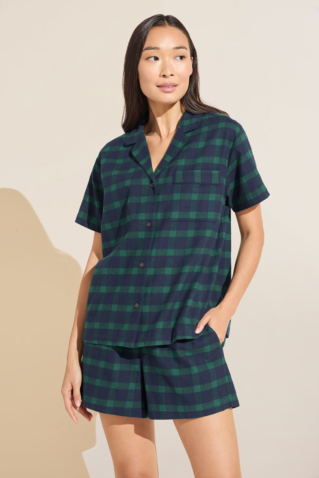 Model wears Flannel Short PJ Set in Navy and Green plaid.