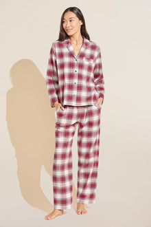 Model wears Flannel Long PJ Set in red and ivory plaid.