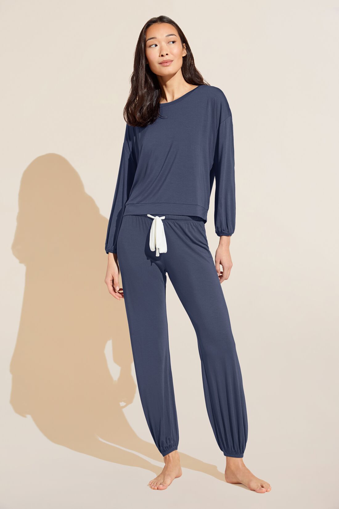 Model wears Gisele TENCEL™ Modal Effortless PJ Set in nightshadow blue/ivory.