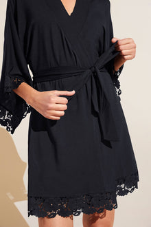 Model wears Naya TENCEL Modal Robe in Black.