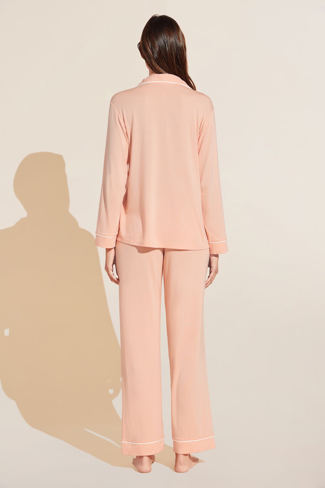 Model is Wearing the Gisele TENCEL™ Modal Long PJ Set in Peach Parfait/Ivory.