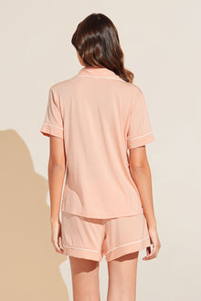 Model wears Gisele TENCEL™ Modal Relaxed Short PJ Set in peach parfait/ivory.