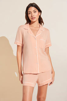 Model wears Gisele TENCEL™ Modal Relaxed Short PJ Set in peach parfait/ivory.