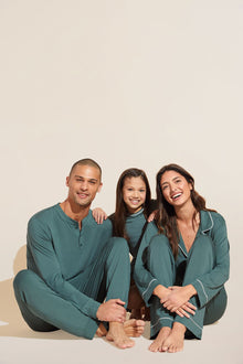 Model wears Kids TENCEL™ Modal Unisex Short PJ Set in Agave/Ivory.