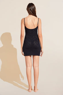 Model wears Soft Stretch Recycled Lace Slip in Black.
