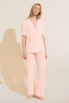 Model wears Gisele TENCEL Modal Short Sleeve & Pant PJ Set in petal pink/ivory.