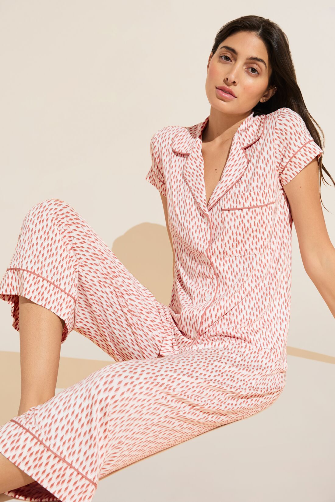 Model wears Gisele Printed TENCEL™ Modal Short Sleeve Cropped PJ Set in double diamond rouge pink print.