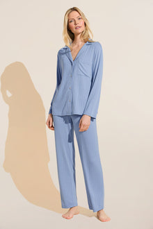 Model wears Gisele TENCEL™ Modal Rib Long PJ Set in wedgewood blue.