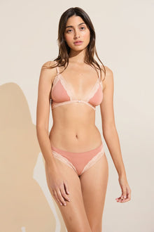 Model wears Flora TENCEL Modal Thong in Pink Rouge/Rose.