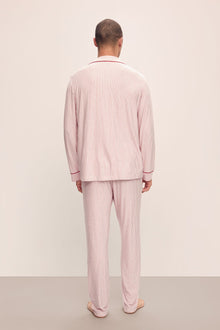 Model wears William Printed TENCELâ„¢ Modal Long PJ Set in Duo Stripe Haute Red/Haute Red.