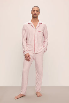 Model wears William Printed TENCELâ„¢ Modal Long PJ Set in Duo Stripe Haute Red/Haute Red.