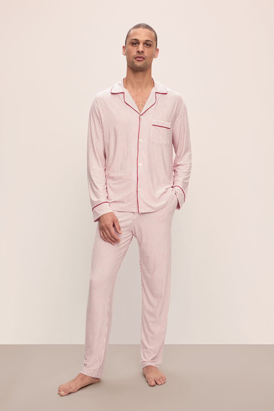 Model wears William Printed TENCELâ„¢ Modal Long PJ Set in Duo Stripe Haute Red/Haute Red.