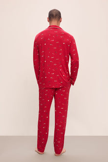 Model wears William Printed TENCELâ„¢ Modal Long PJ Set in Winter Wonderland Haute Red/Ivory.