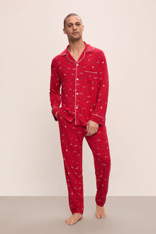 Model wears William Printed TENCELâ„¢ Modal Long PJ Set in Winter Wonderland Haute Red/Ivory.