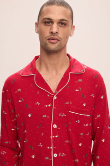 Model wears William Printed TENCELâ„¢ Modal Long PJ Set in Winter Wonderland Haute Red/Ivory.