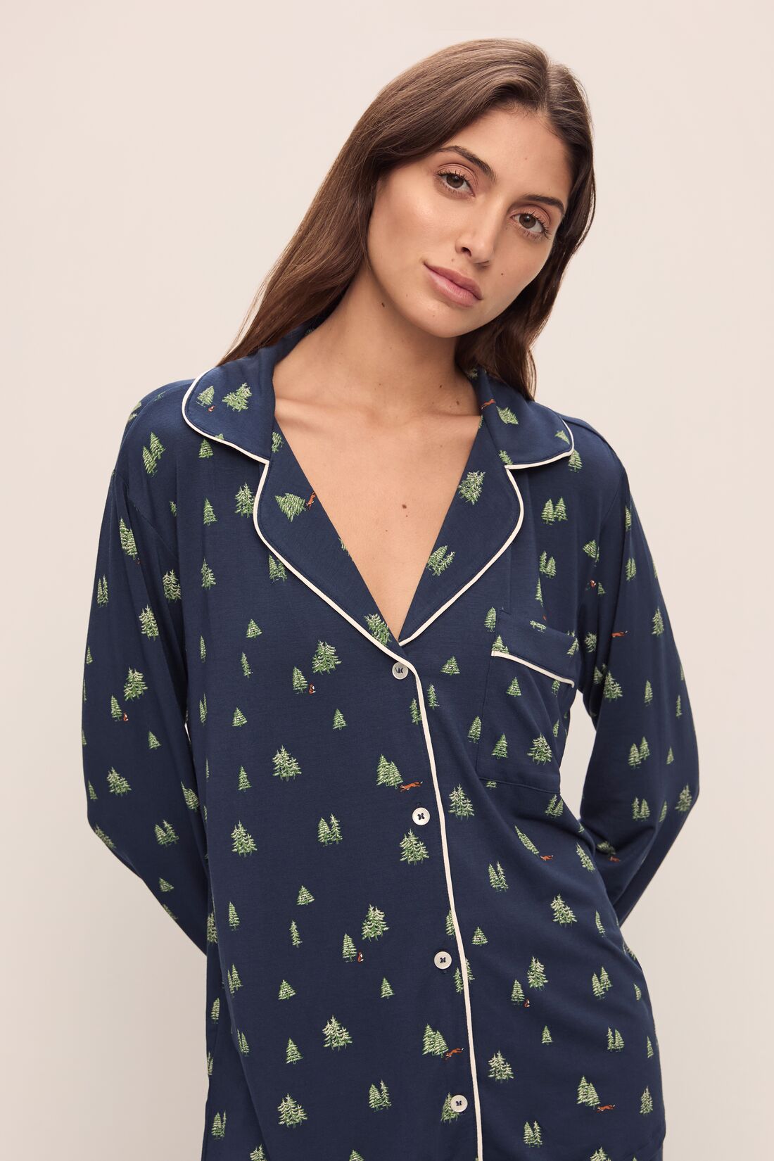 Model wears the Gisele Printed TENCELâ„¢ Modal Long PJ Set in Woodland Pine Navy/Ivory.