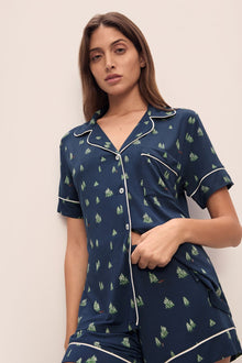 Model wears Gisele Printed TENCELâ„¢ Modal Relaxed Short PJ Set in Woodland Pine Navy/Ivory.