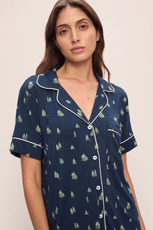 Model wears Gisele Printed TENCELâ„¢ Modal Relaxed Short PJ Set in Woodland Pine Navy/Ivory.