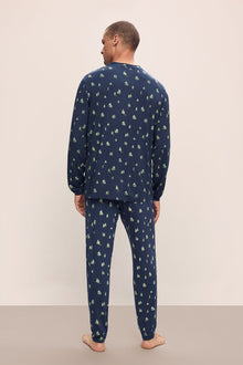 Model wears Henry Printed TENCELâ„¢ Modal Long PJ Set in Woodland Pine Navy/Ivory.