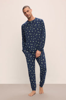 Model wears Henry Printed TENCELâ„¢ Modal Long PJ Set in Woodland Pine Navy/Ivory.