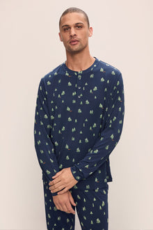 Model wears Henry Printed TENCELâ„¢ Modal Long PJ Set in Woodland Pine Navy/Ivory.