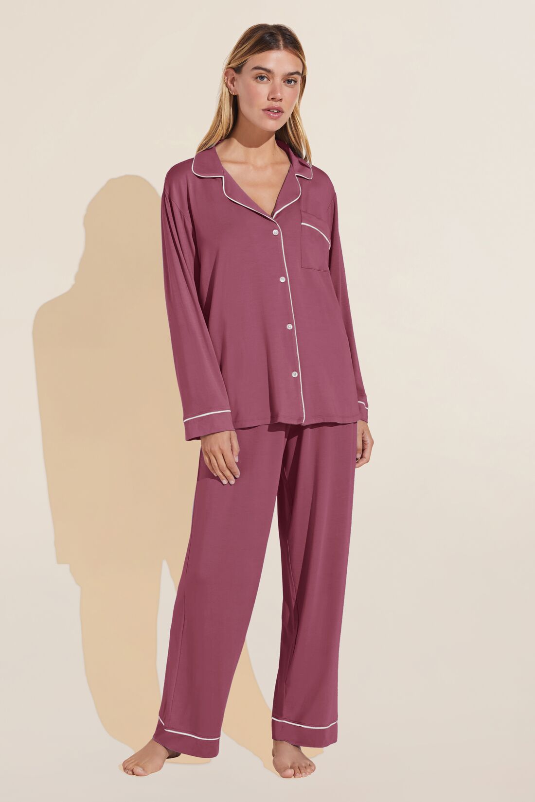 Model wears Gisele TENCELâ„¢ Modal Long PJ Set in Raspberry/Ivory.