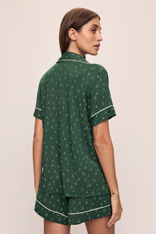 Model wears Gisele Printed TENCELâ„¢ Modal Relaxed Short PJ Set in Winterpine Forest Green/Ivory.