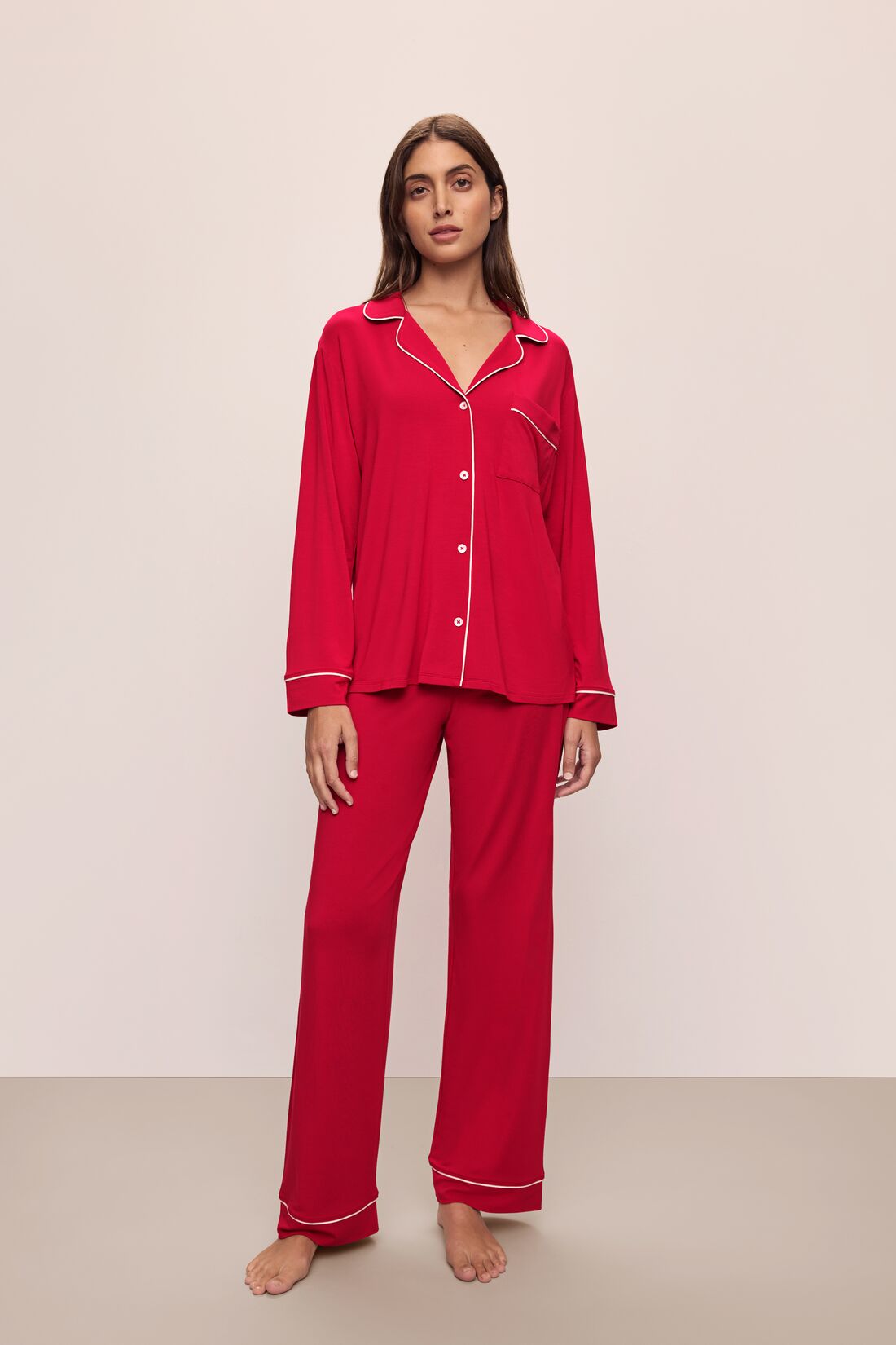 Model wears the Gisele TENCELâ„¢ Modal Long PJ Set in Haute Red/Ivory.