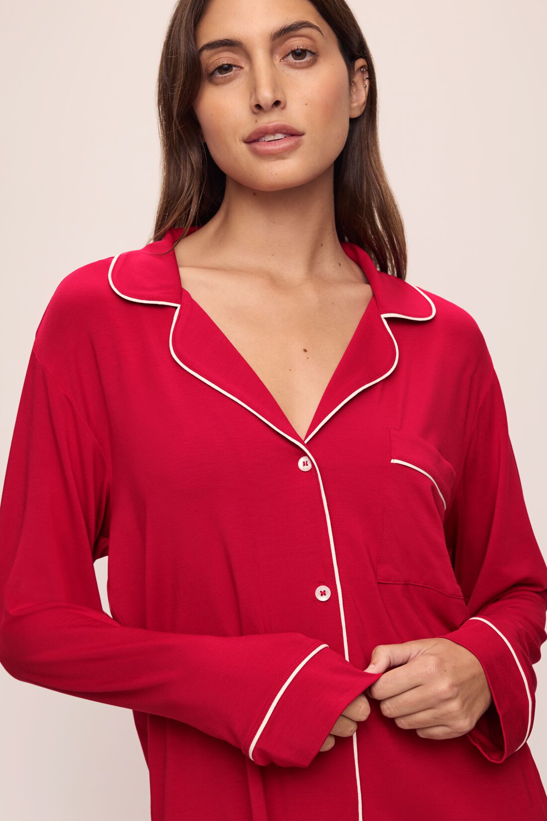 Model wears the Gisele TENCELâ„¢ Modal Long PJ Set in Haute Red/Ivory.