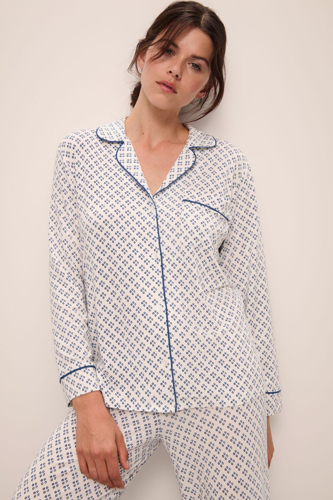 Model wears Gisele Printed TENCELâ„¢ Modal Long PJ Set in Petite Batik Ivory/Denim Blue.