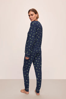Model wears the Gisele Printed TENCELâ„¢ Modal Crewneck PJ Set in Woodland Pine Navy/Ivory.