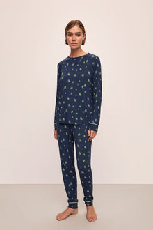 Model wears the Gisele Printed TENCELâ„¢ Modal Crewneck PJ Set in Woodland Pine Navy/Ivory.