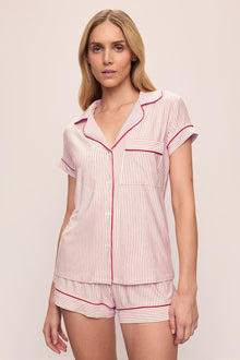Model wears the Gisele Printed TENCELâ„¢ Modal Shortie Short PJ Set in Duo Stripe Haute Red/Haute Red.