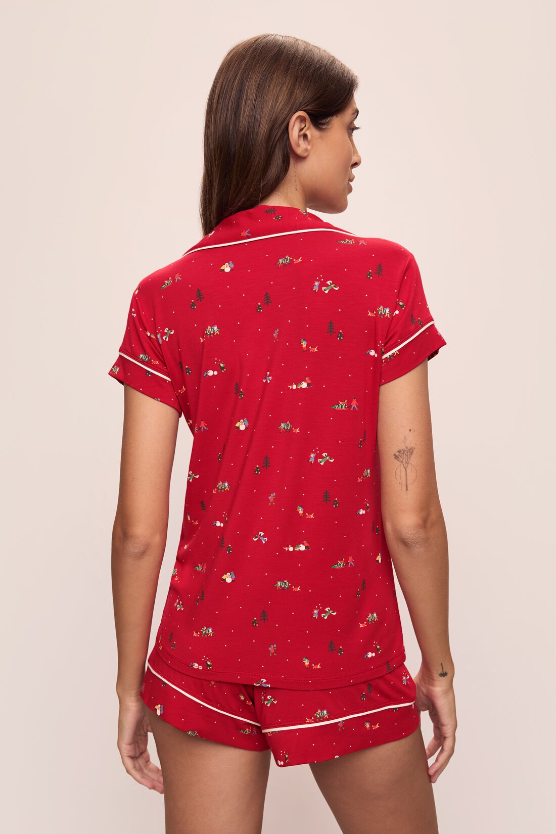 Model wears the Gisele Printed TENCELâ„¢ Modal Shortie Short PJ Set in Winter Wonderland Haute Red/Ivory.